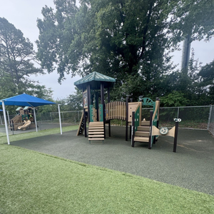 Safe, fenced playground area at Childcare Network where children enjoy active outdoor play