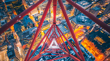 View of a dense city through a crane.
