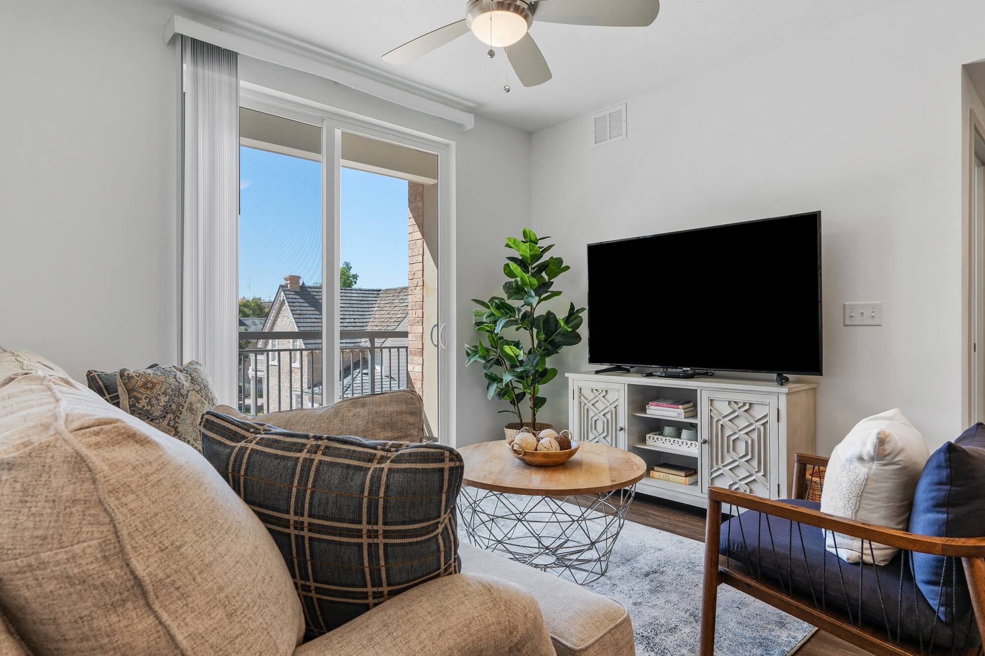 a living room with a couch and a tv