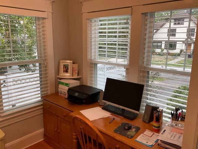 Are you looking to upgrade your home office? Our Wood Blinds are the perfect fit! Check out how these Blinds seamlessly align with the windows in this home office in Ossining, New York.