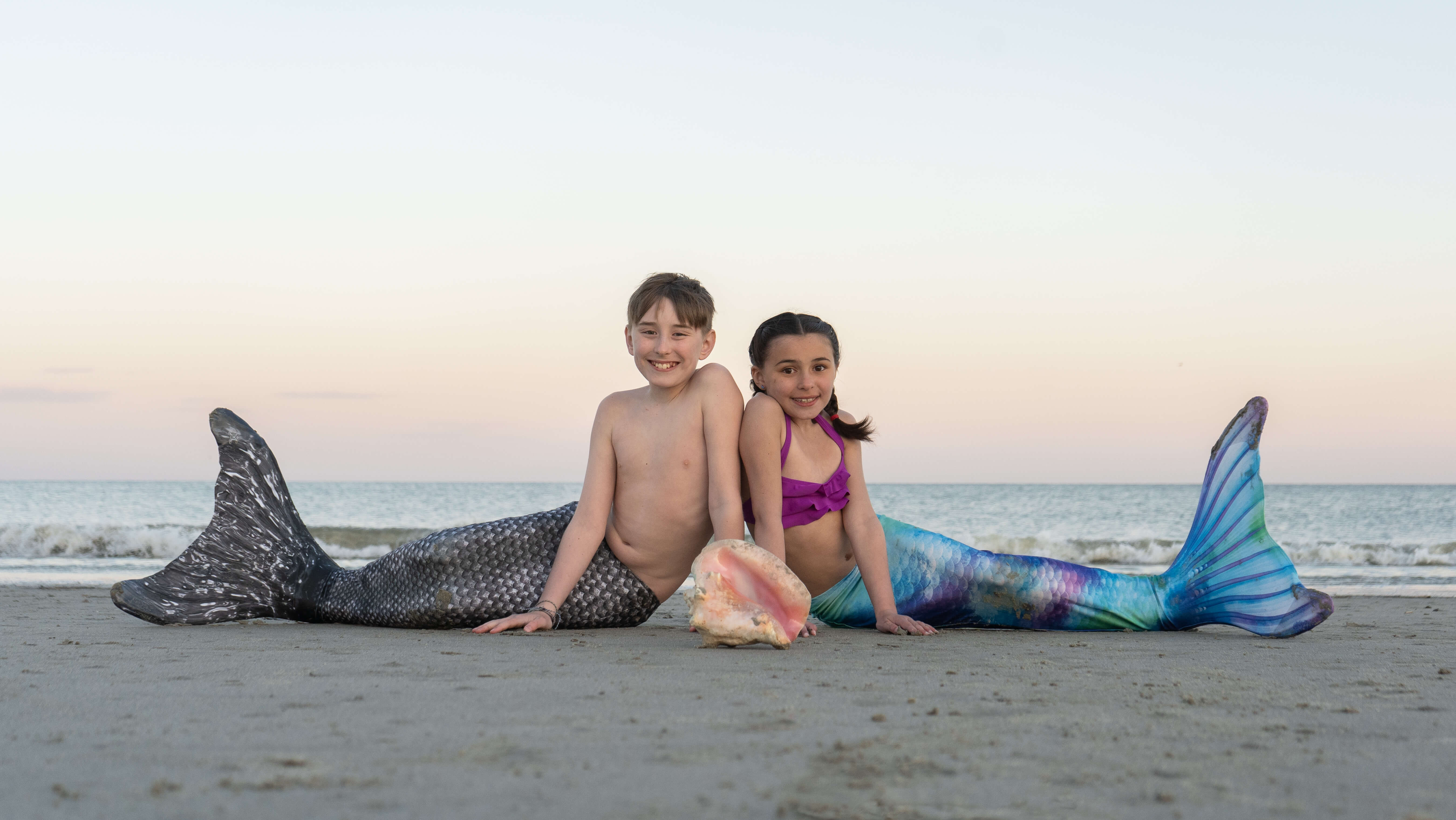 Brother and sister mermaids