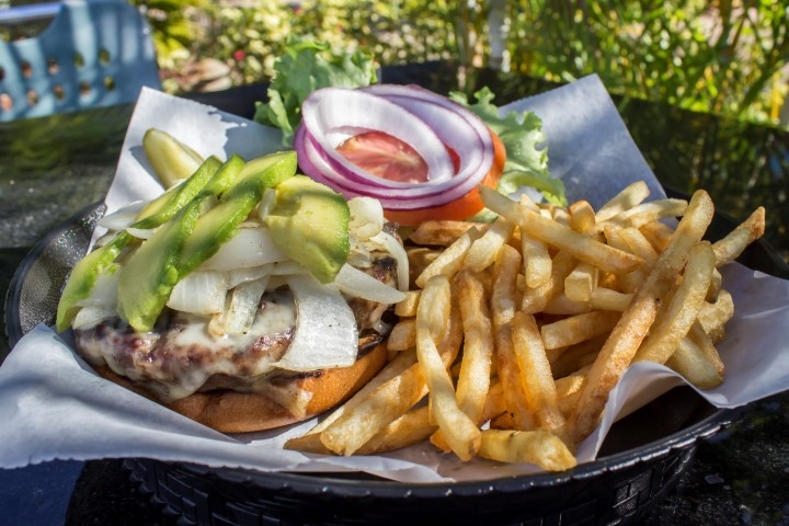 The Avocado Burger, topped with avocado, Swiss cheese and onions, at Marina 84 Sports Bar & Grill.