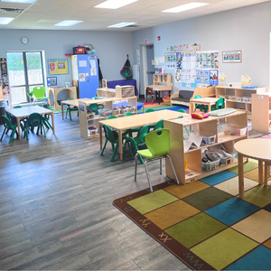 Bright and colorful preschool classroom at Childcare Network with age-appropriate learning materials