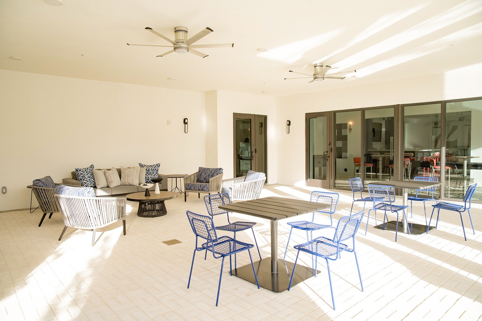 Covered patio with lounge seating and dining area