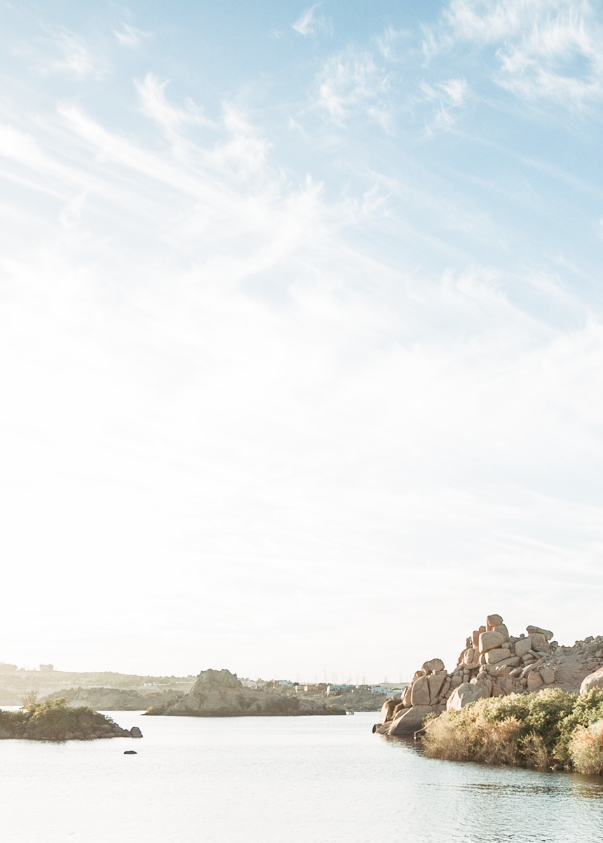 A scenic view of a rocky shoreline.
