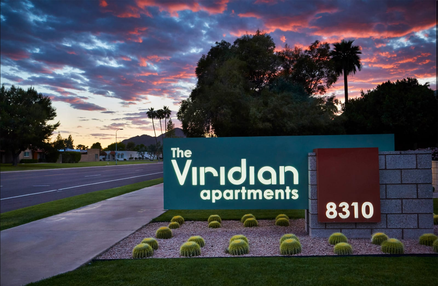 Viridian Apartments Welcome Sign with Manicured Landscaping Surrounding the Small Cacti