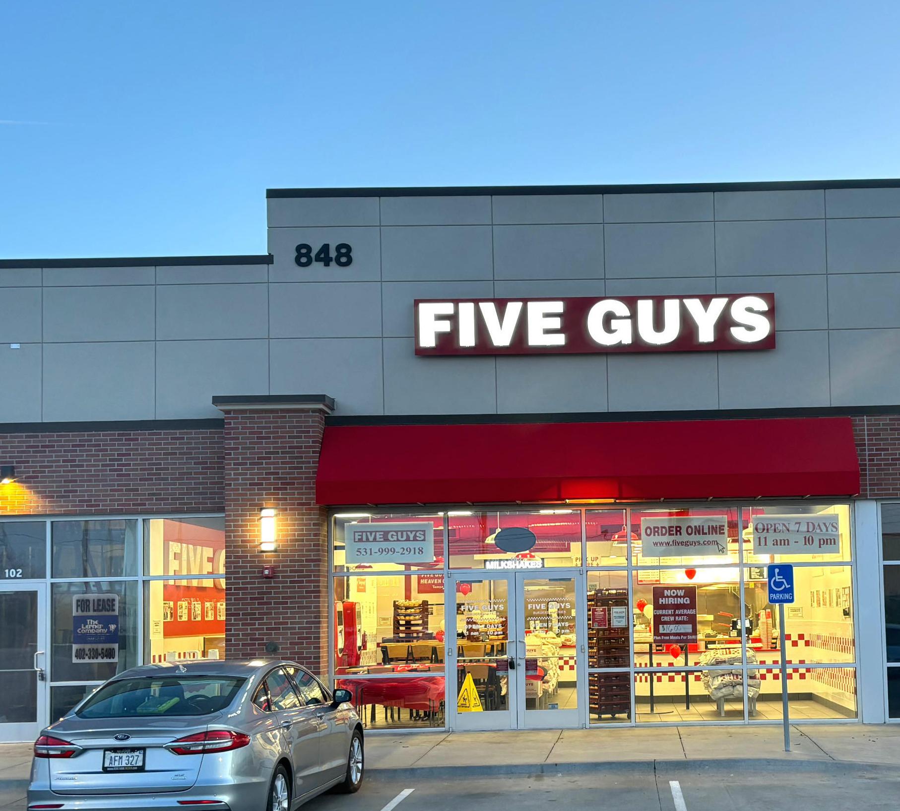 Exterior photograph of the Five Guys restaurant at 848 Cornhusker Road in Bellevue, Nebraska. Five Guys Bellevue (531)203-5228