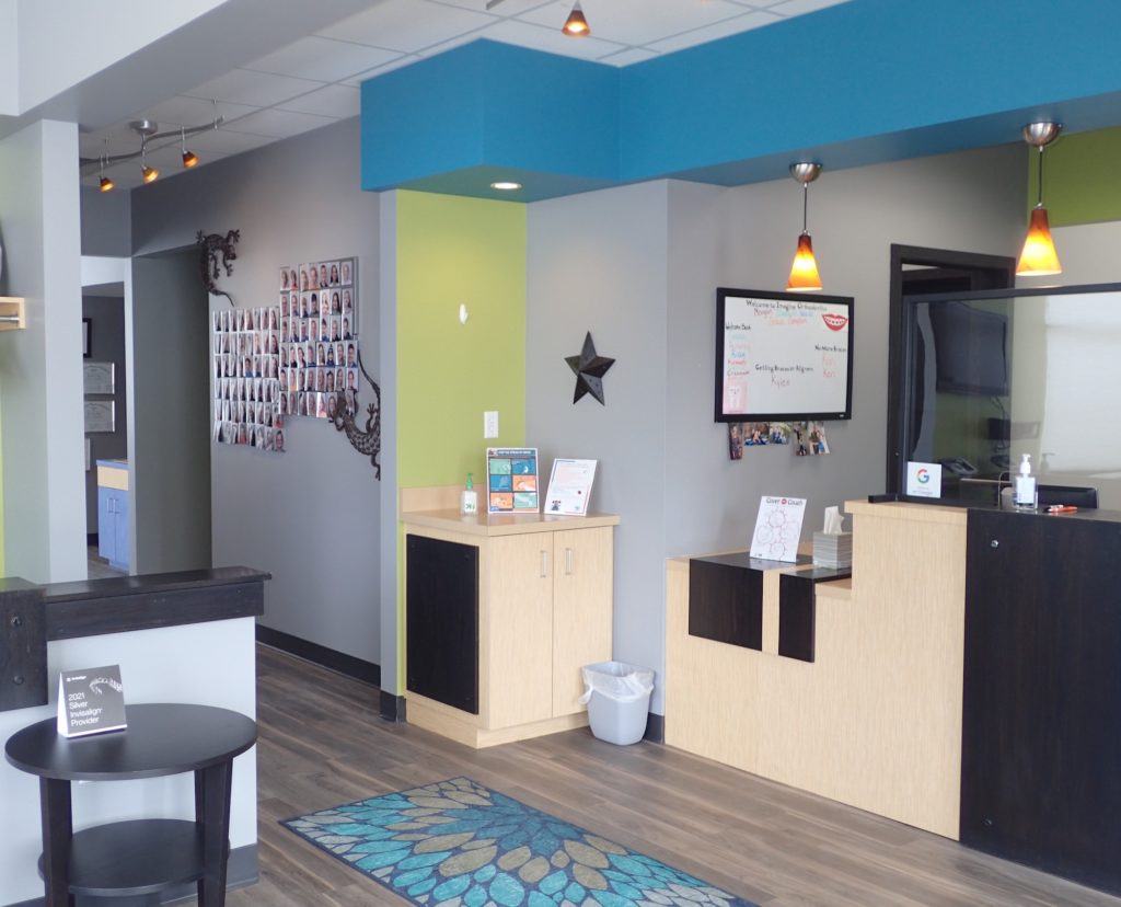 Welcome to Imagine Orthodontics! Our bright and inviting waiting area sets the tone for a positive orthodontic experience.