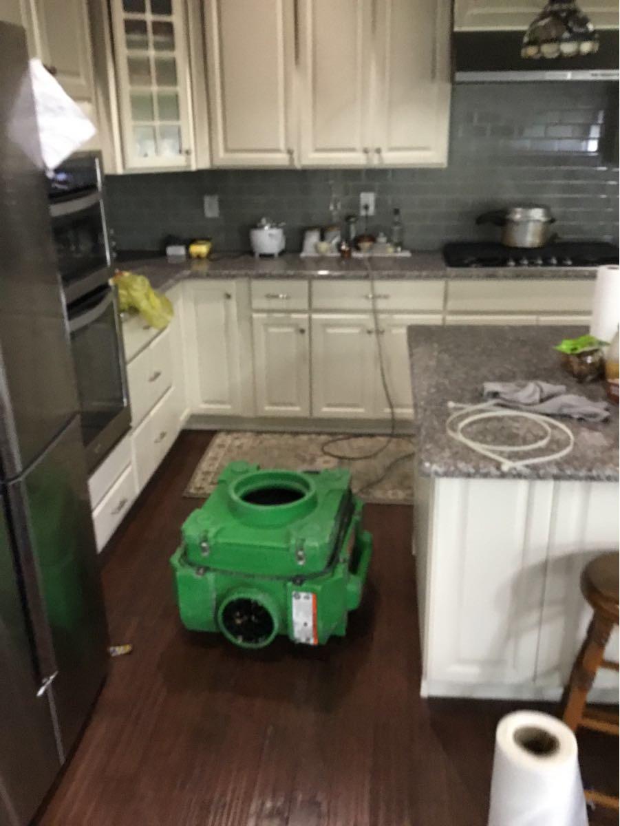 Fire damage restoration equipment setup and cleaning by a local SERVPRO team in Brooklyn