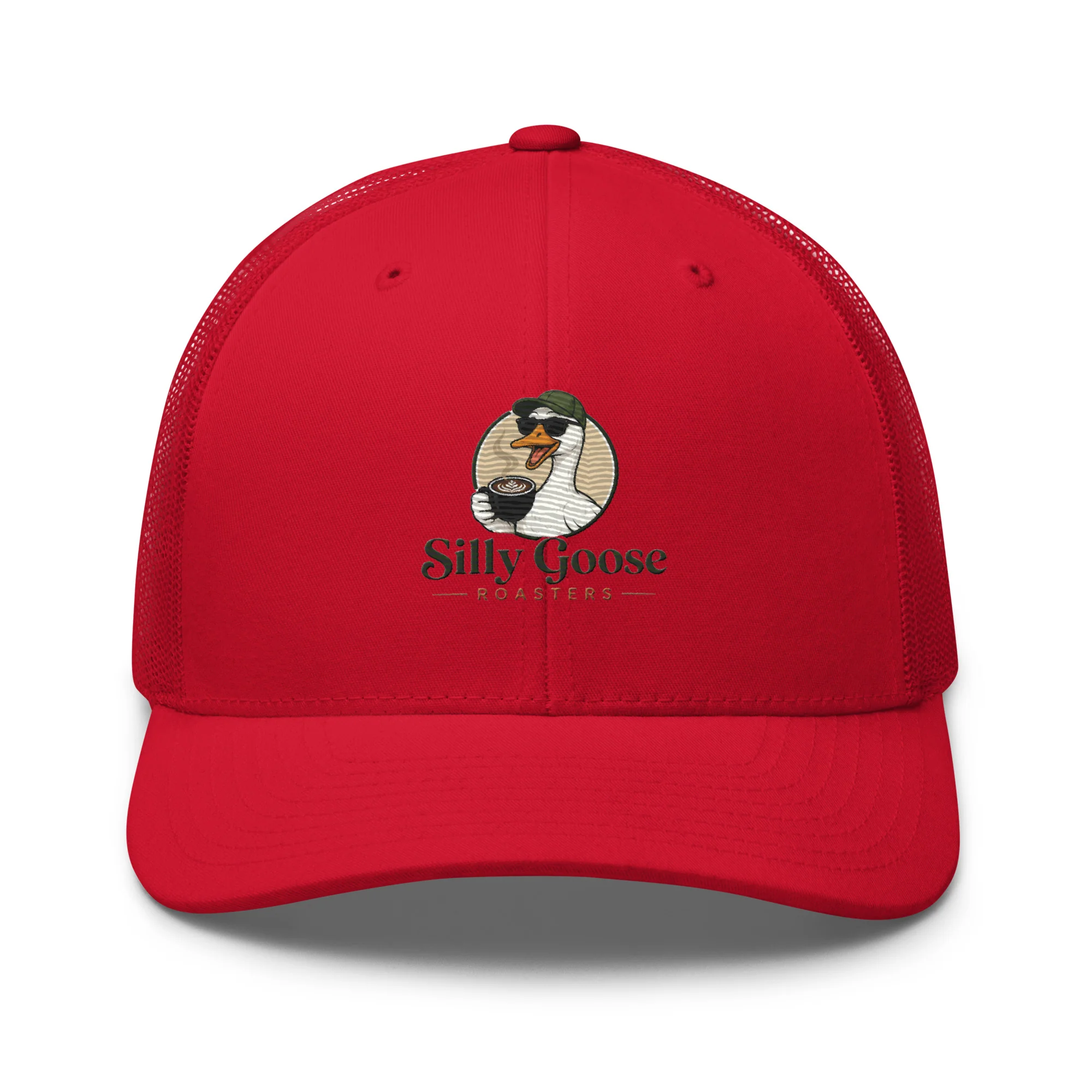 A red trucker hat with a logo on the front. The logo features a cartoon goose wearing sunglasses and a green hat, holding a coffee cup with latte art. Below the goose, the words "Silly Goose ROASTERS" are written in stylized green lettering.
