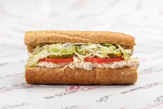 Lettuce, tomatoes, pickles, blended oils, salt & pepper.