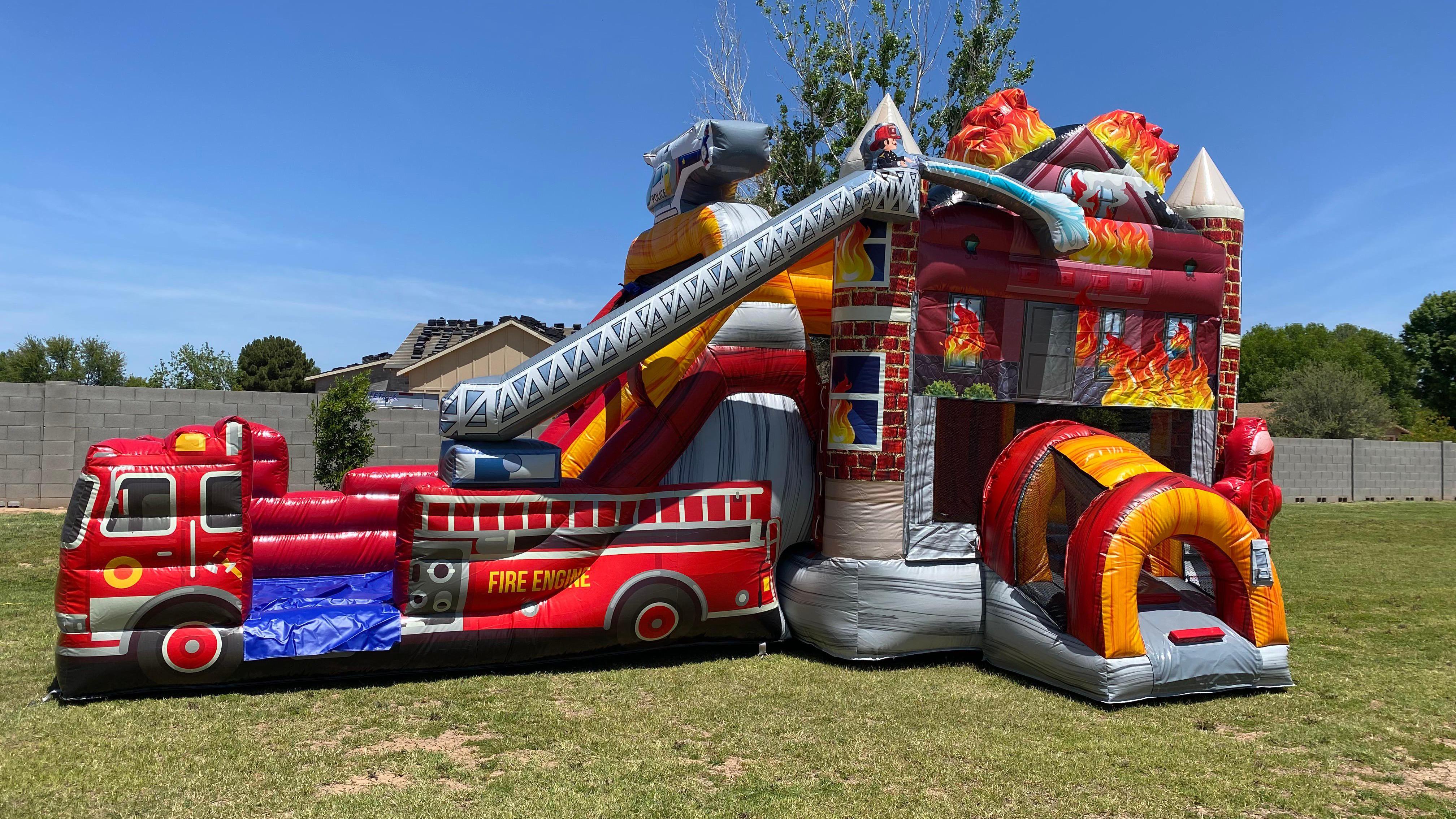 Firehouse Double Slide Bounce House Rental! This Firehouse Bounce House with an Inflatable Double Slide and Basketball hoop will make a big impression on your kiddo and guests!  The Firetruck Slide that is attached to the bounce house has a realistic-looking latter with firefighters hosing down the burning building! Start by climbing through the tunnel to a large bouncing and jumping area with a basketball hoop attached.  Once you are done jumping you can climb up the slide and slide to the bottom.  With a 3d fire hydrant and bright-colored digital printing, this is the best Firetruck bounce house available.   This inflatable rental is a showstopper for birthday parties all the way to large-scale events.