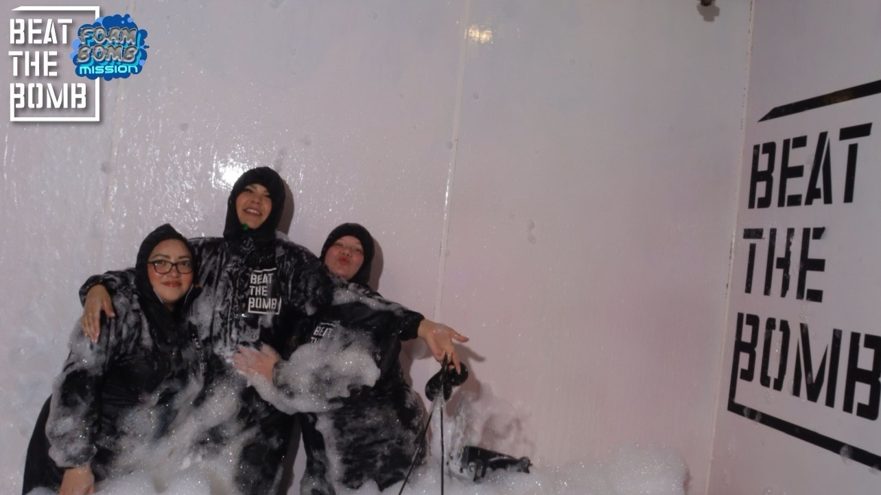 Our team works together inside and outside the office to get the job done! We had a great time at the Foam Bomb Mission!