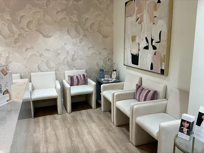 Private consultation room for Women’s Wellness Institute of Dallas and cosmetic gynecology services, designed for comfortable, confidential patient care and personalized treatment discussions.