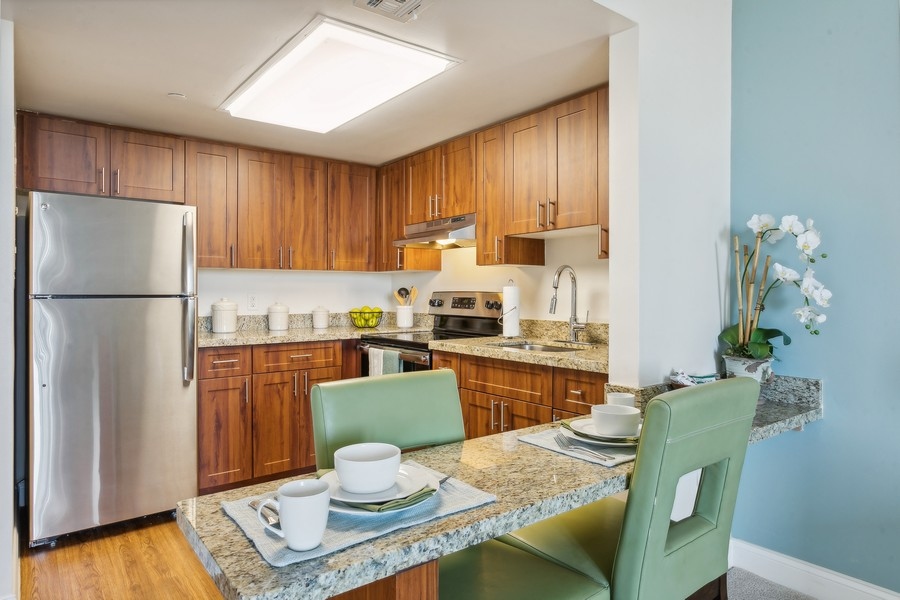 Fountainview model apartment kitchen with counter seating