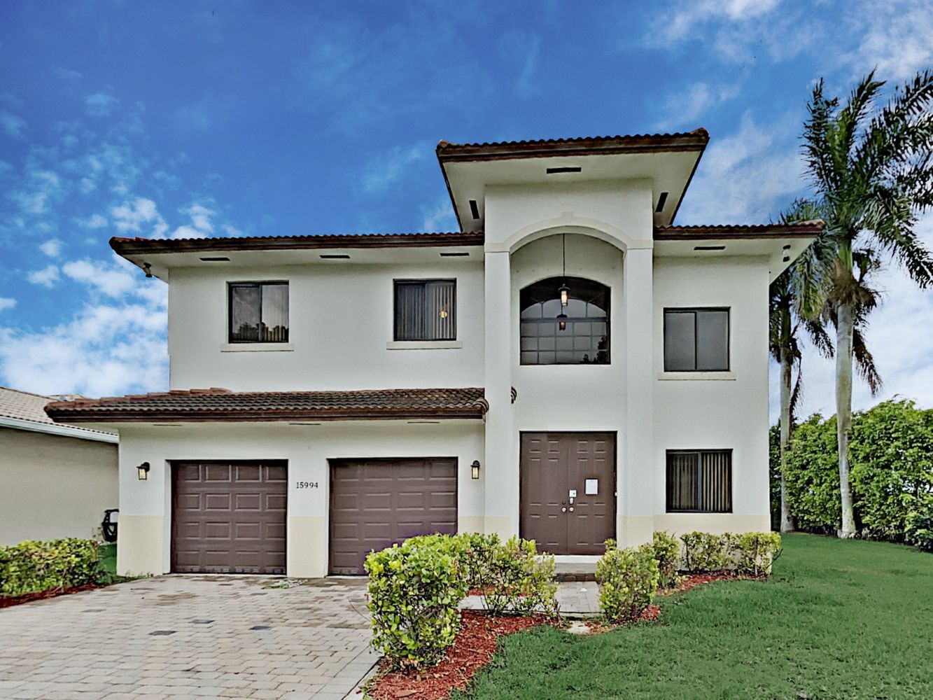 Beautiful two-story Invitation Homes property with a garage in South Florida.