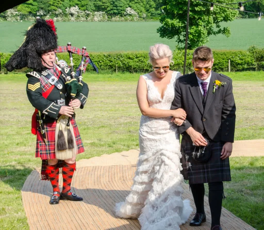 Images Andrew Paton Highland Bagpiper