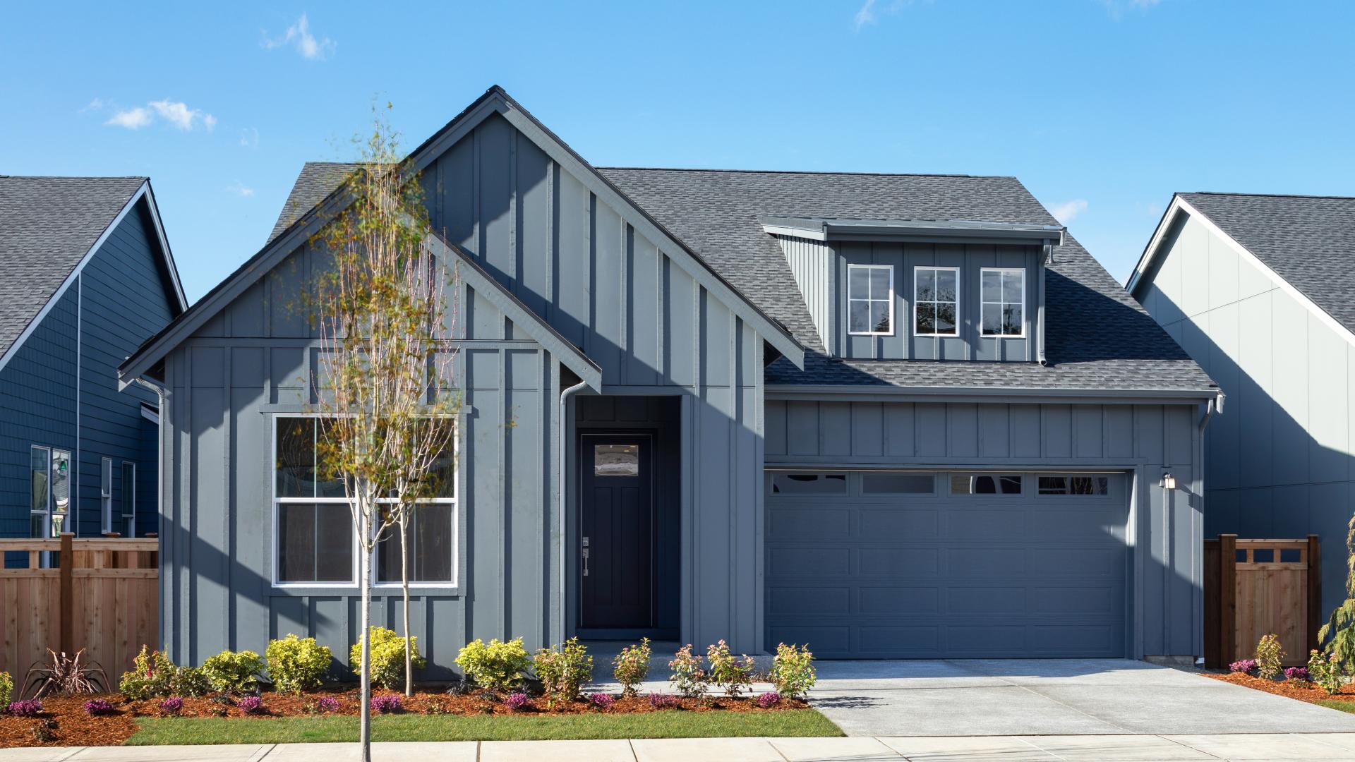 Modern Farmhouse architecture shown in a dark color palette