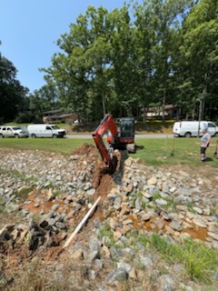 &ldquo;Excavating the path from the main sewer line to the house.