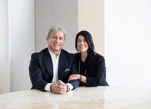 Naman Private Wealth clients, Luis and Jocelyn, sitting arm in arm.