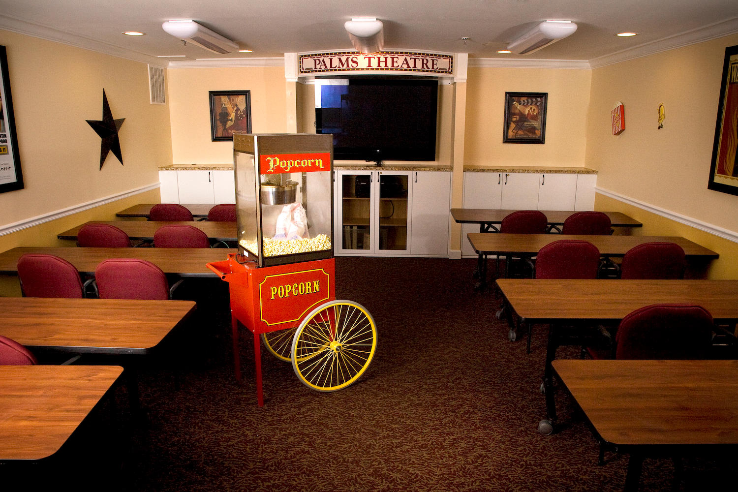 The Palms of Fort Myers theater room with popcorn machine