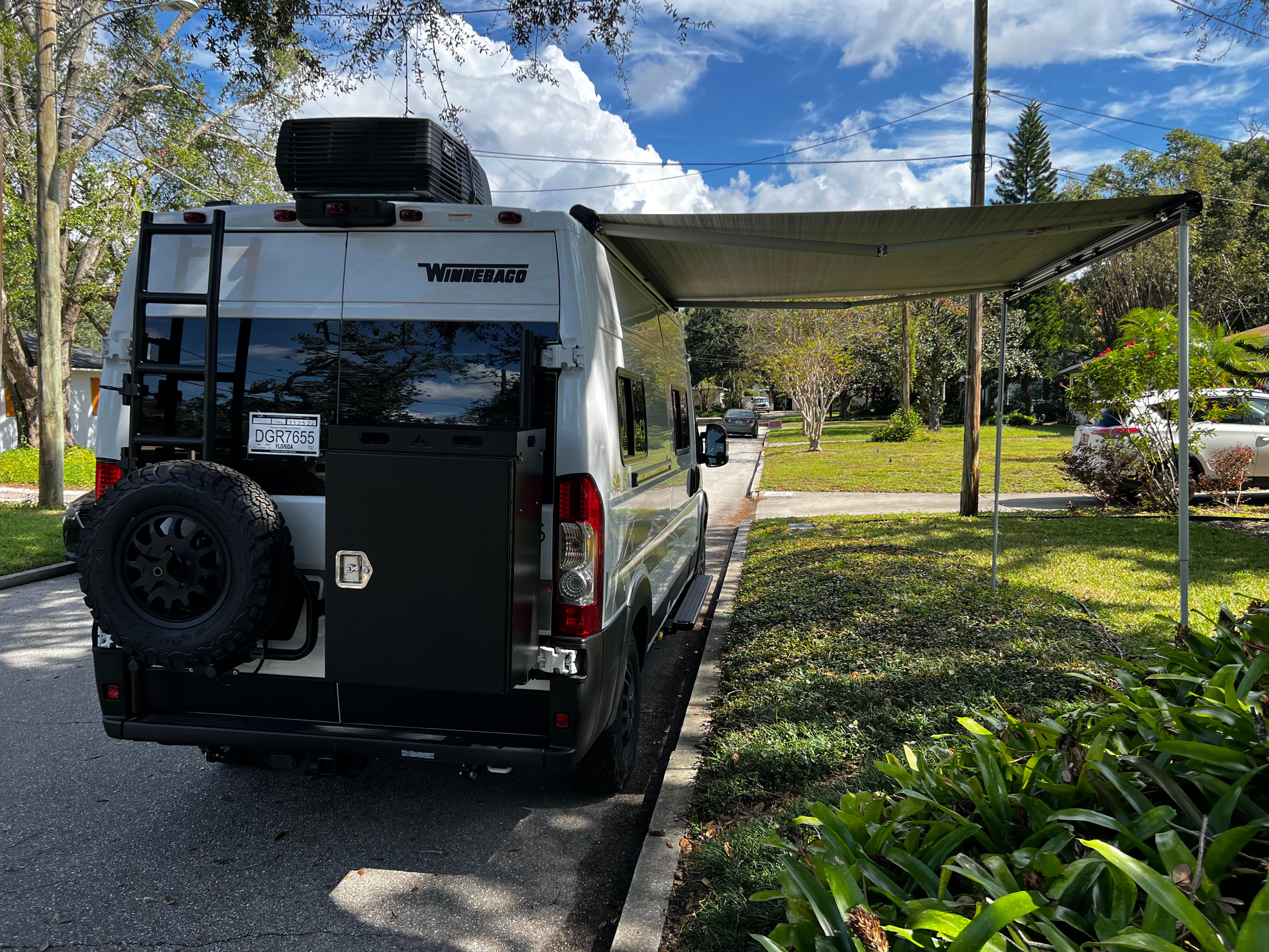 Solis Pocket with Van.Life installed awning, generator, lift kit, wheels and tires, Aluminess tire carrier with ladder, Aluminess swingaway storage box.