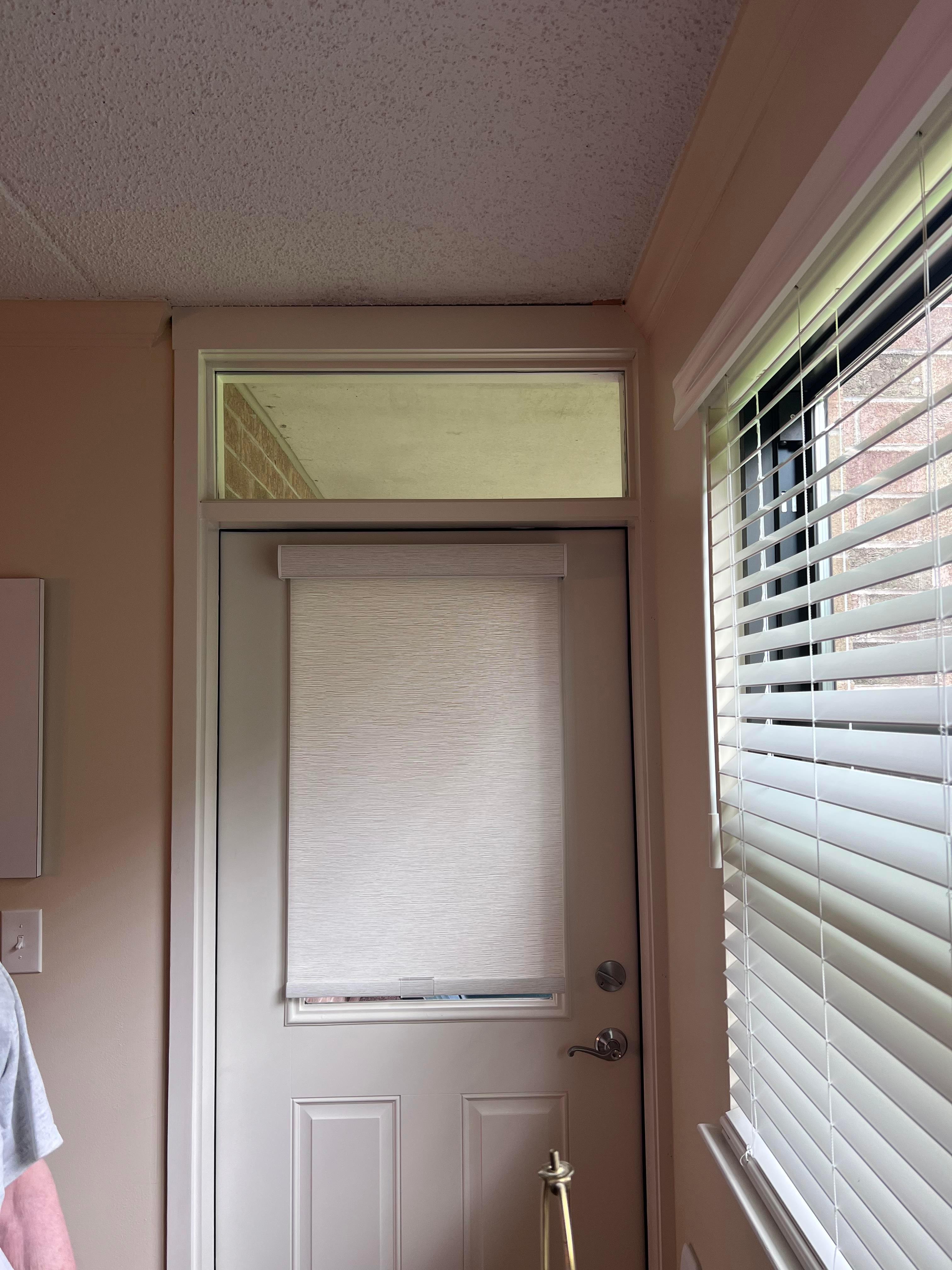 Looking for ideas to have privacy on glass doors?  Roller shades are a great solution to cover your doors.