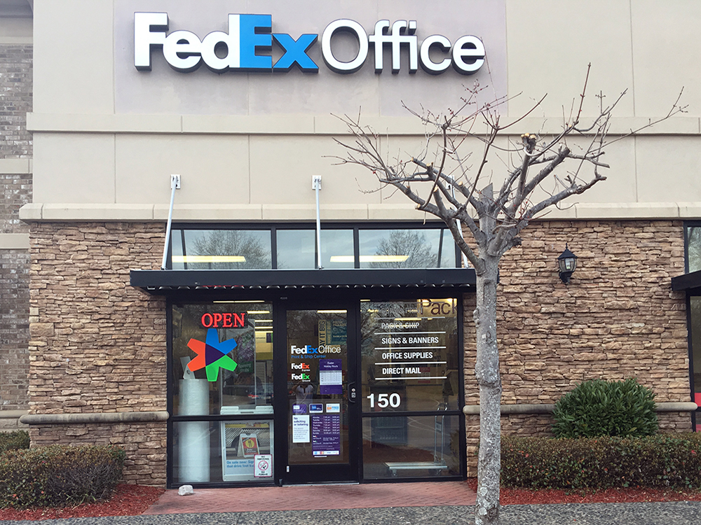 Exterior photo of FedEx Office location at 11600 Medlock Bridge Rd\t Print quickly and easily in the self-service area at the FedEx Office location 11600 Medlock Bridge Rd from email, USB, or the cloud\t FedEx Office Print & Go near 11600 Medlock Bridge Rd\t Shipping boxes and packing services available at FedEx Office 11600 Medlock Bridge Rd\t Get banners, signs, posters and prints at FedEx Office 11600 Medlock Bridge Rd\t Full service printing and packing at FedEx Office 11600 Medlock Bridge Rd\t Drop off FedEx packages near 11600 Medlock Bridge Rd\t FedEx shipping near 11600 Medlock Bridge Rd