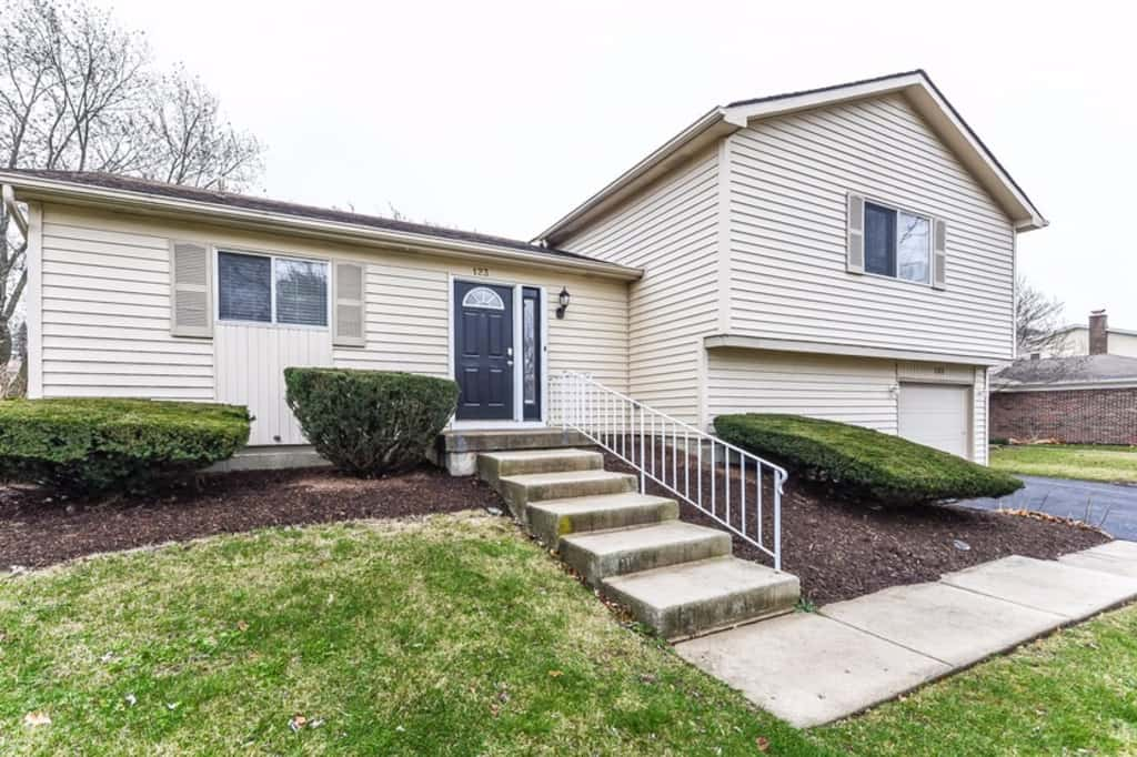 Charming home with front lawn and garage at Invitation Homes Chicago.