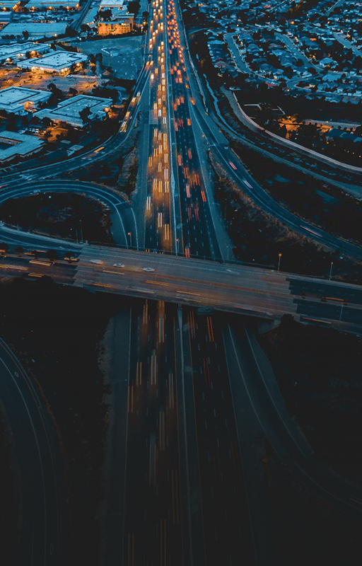 Aerial view of a highway at night.