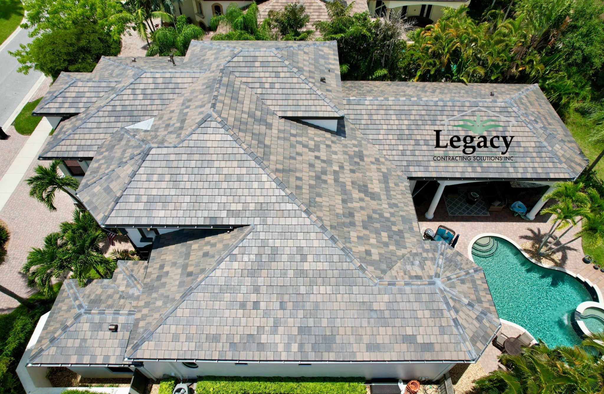 We replaced this roof and the customer chose a stunning flat tile from Eagle. This roof tile color is called Concord Blend.