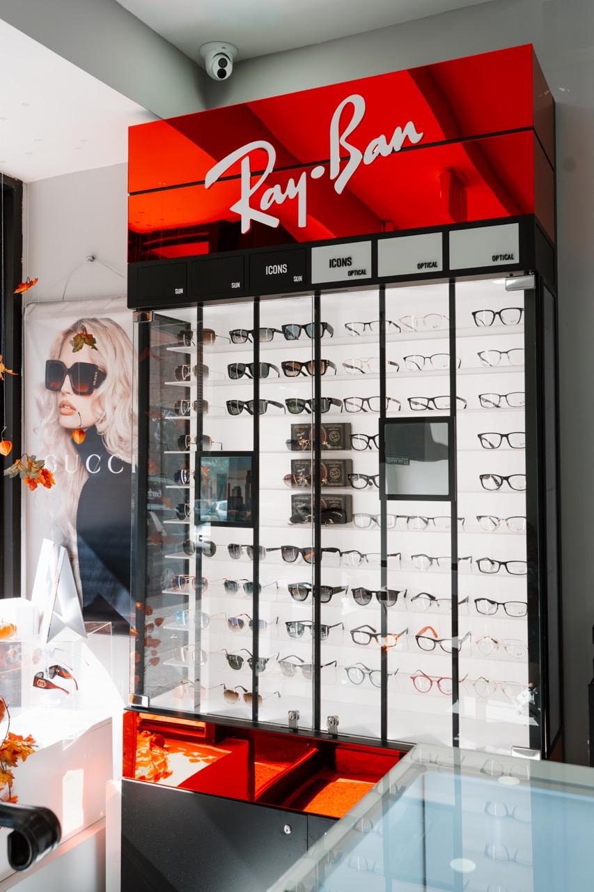 Ray-Ban eyewear display featuring designer eyeglasses and sunglasses at TK Optometry in Brooklyn, NY 