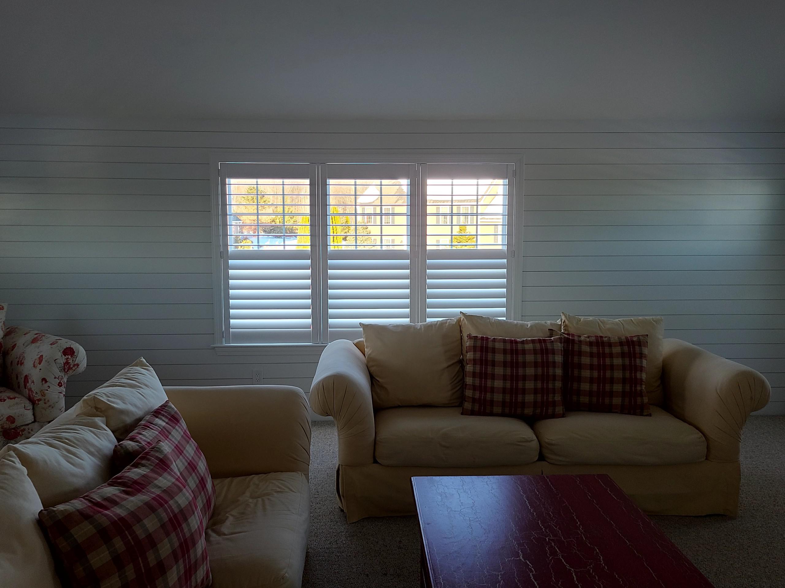These timeless Plantation Shutters look right at home in this living room is Rutland, MA! These windows coverings are great at giving you privacy, whilst allowing the natural light through - plus they look good! It's no wonder these are so popular.