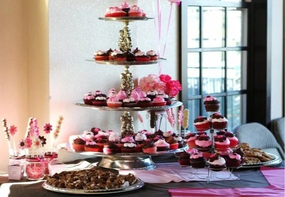 Pink theme cup cake layered table set up