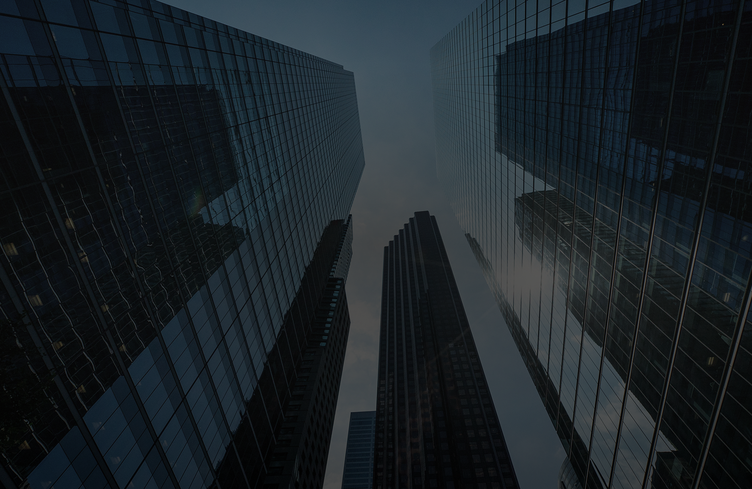 Bottom-up view of skyscrapers.