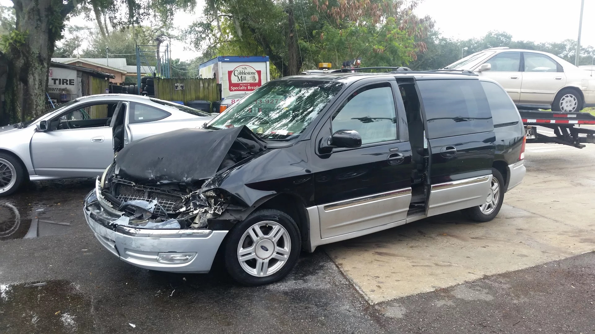 2002 Ford Windstar, too much weed Florida Junk Cars Tampa (813)833-9273