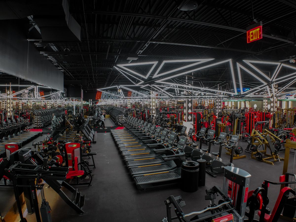 Explore our gym in Lombard, featuring expansive strength training areas, premium equipment, and a sleek, high-performance environment built for serious workouts.