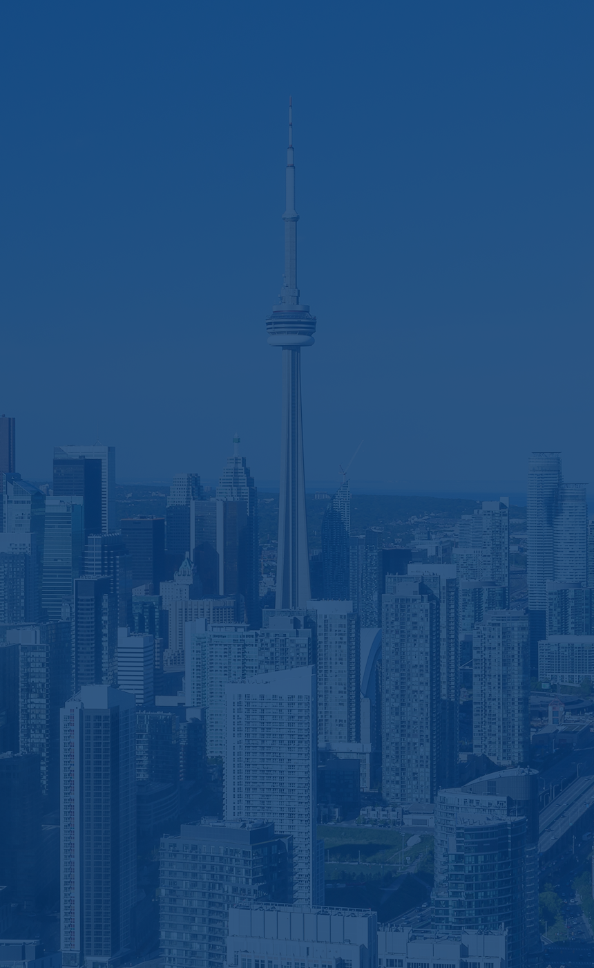 Aerial shot of the Toronto skyline with the CN Tower featured prominently.