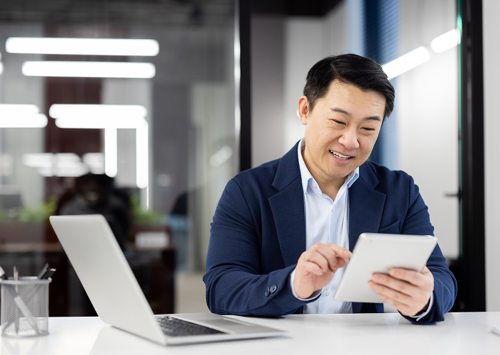 A business owner reviewing his account statements.