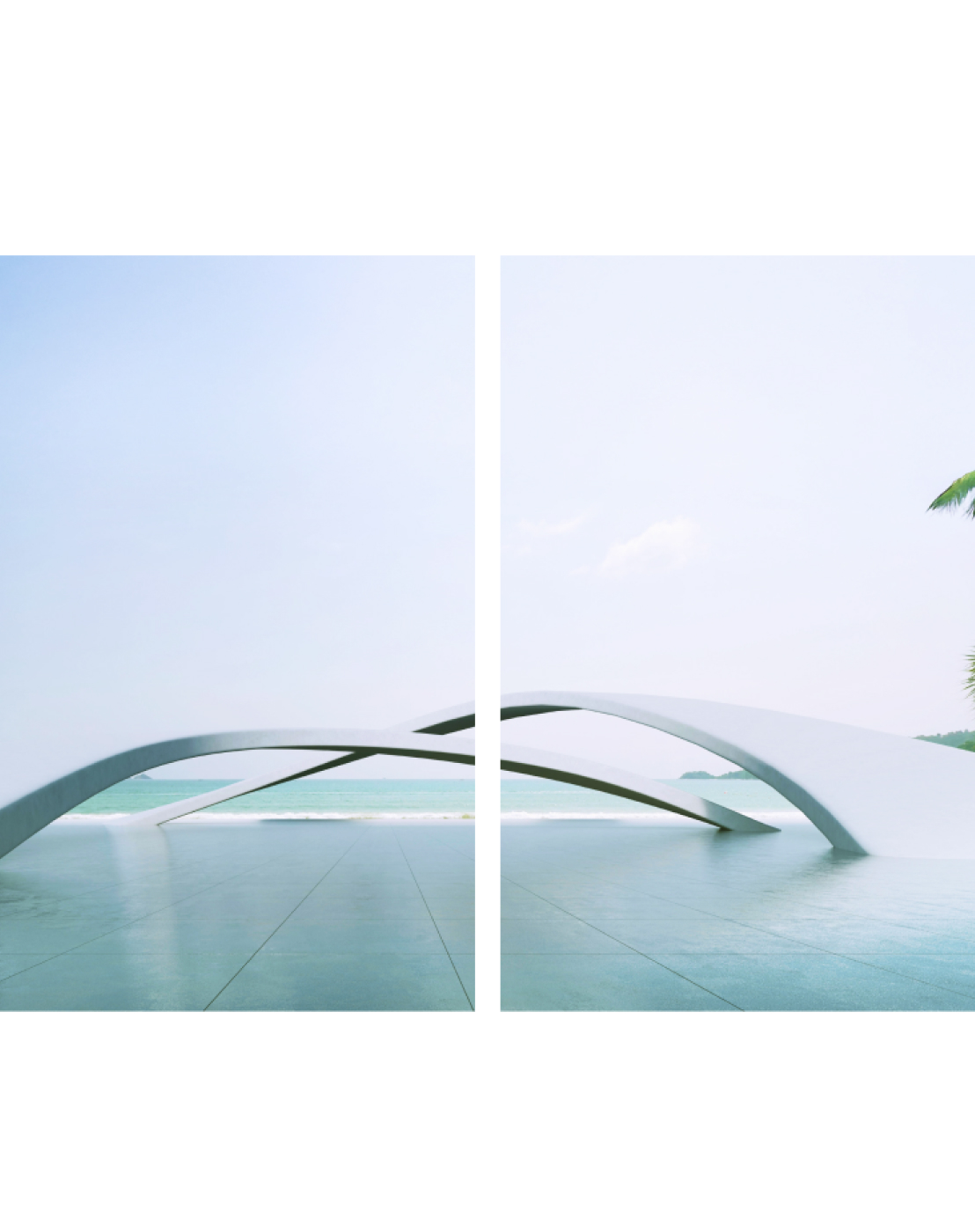A sculpture displayed on the shores of an ocean.