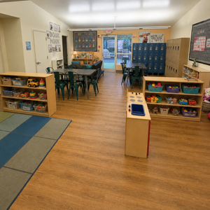 Bright and colorful preschool classroom at Childcare Network with age-appropriate learning materials