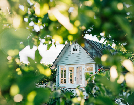 The exterior of a cottage home.
