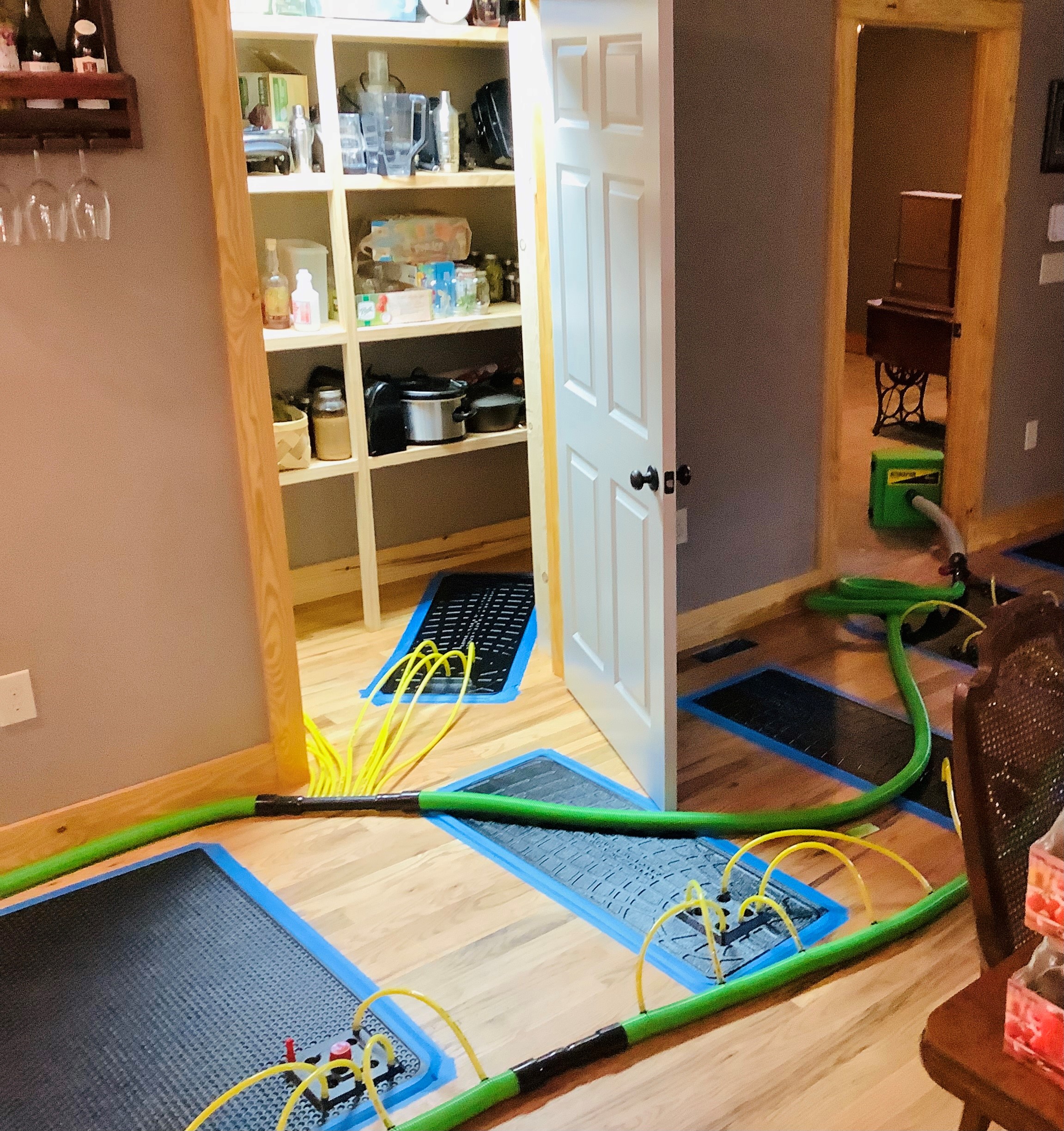 When hardwood floors become wet, we have specialized drying mats to save what would normally be a tear out!