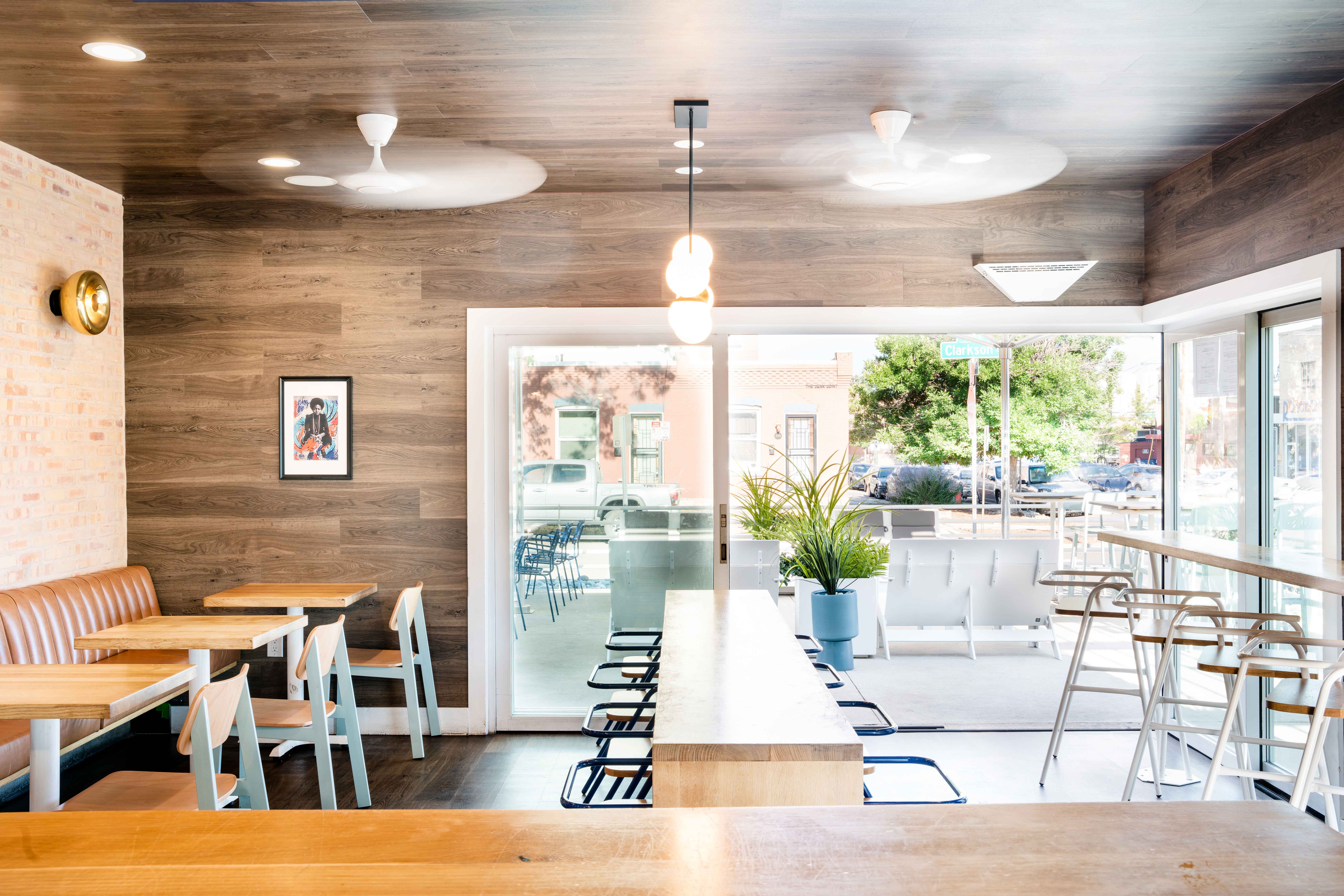 Birdcall Five Points features a cozy interior dining room with sliding walls to access the patio.