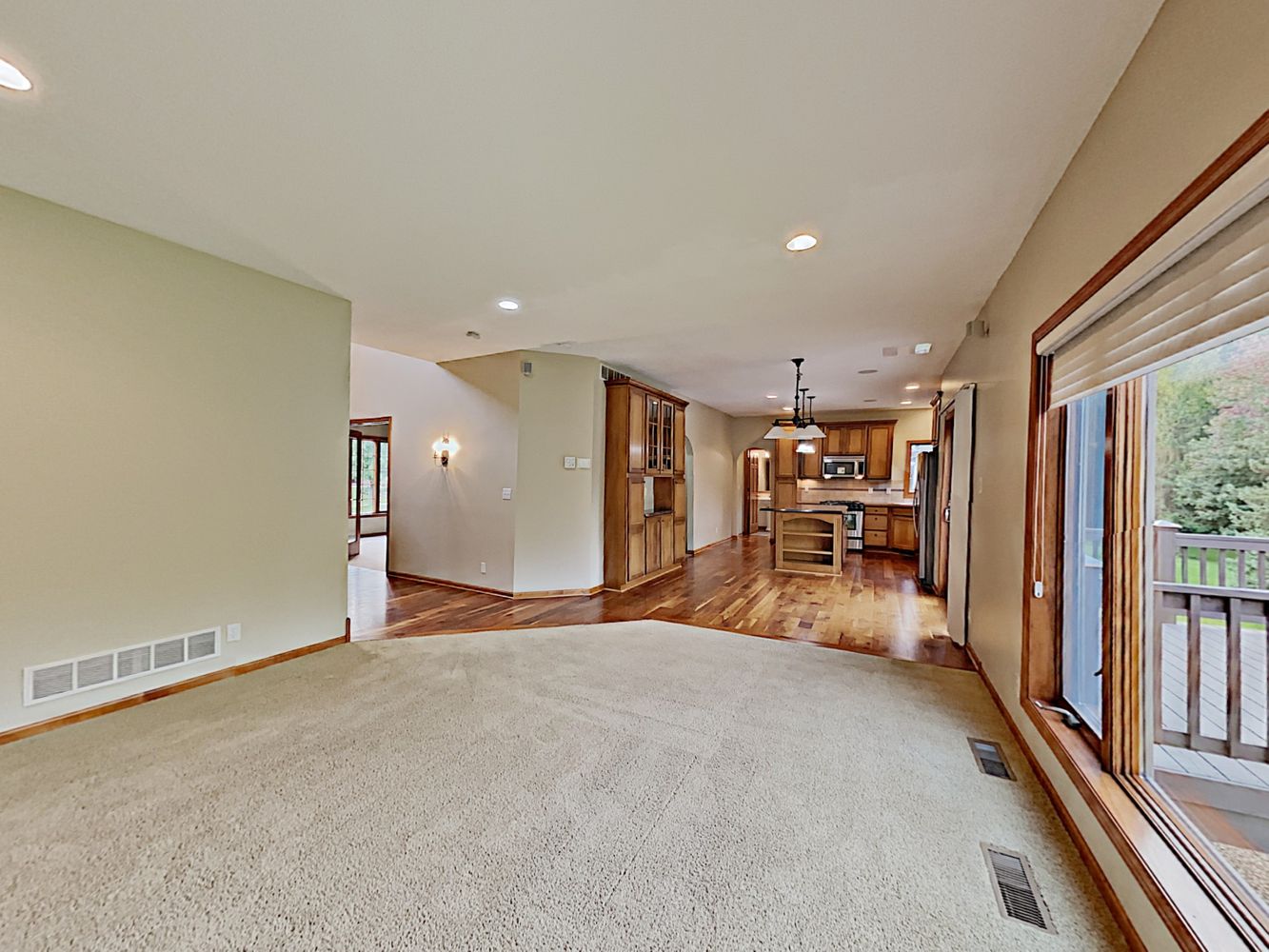 Cozy living room with easy access to kitchen at Invitation Homes Minneapolis.