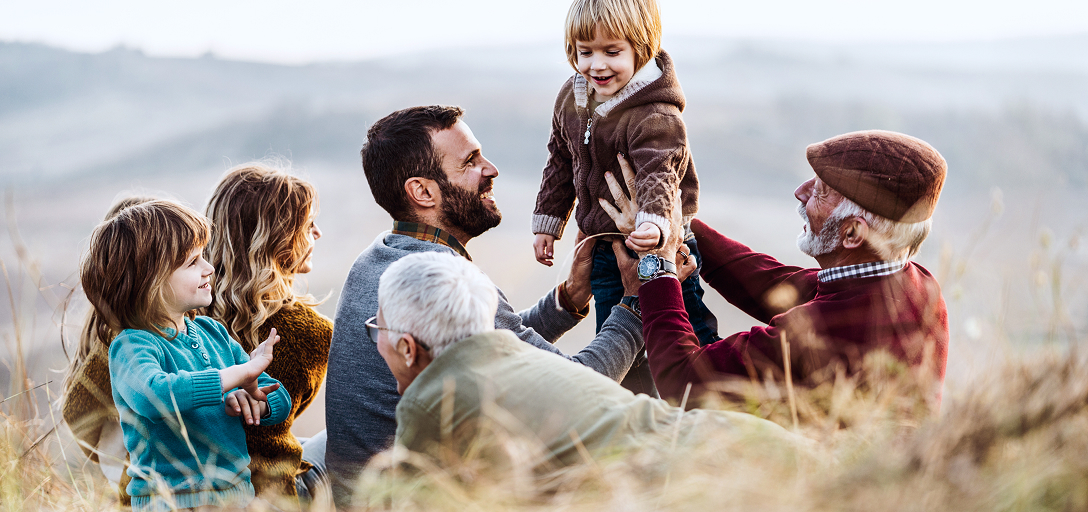 A multigenerational family enjoying the outdoors.