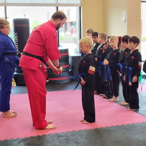 Red Stripes are for trying our best here at Dojo Karate!