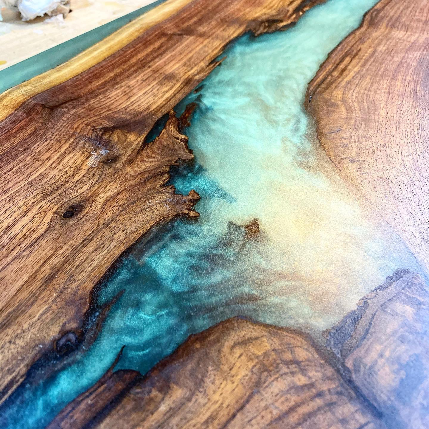 Goodview Woodworks offers exquisite river tables that seamlessly blend natural wood with mesmerizing resin designs, creating stunning centerpieces for your living space. Our river tables are handcrafted to perfection, showcasing the beauty of nature in every piece.