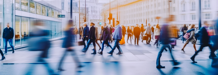 A crowd of people walking outside.