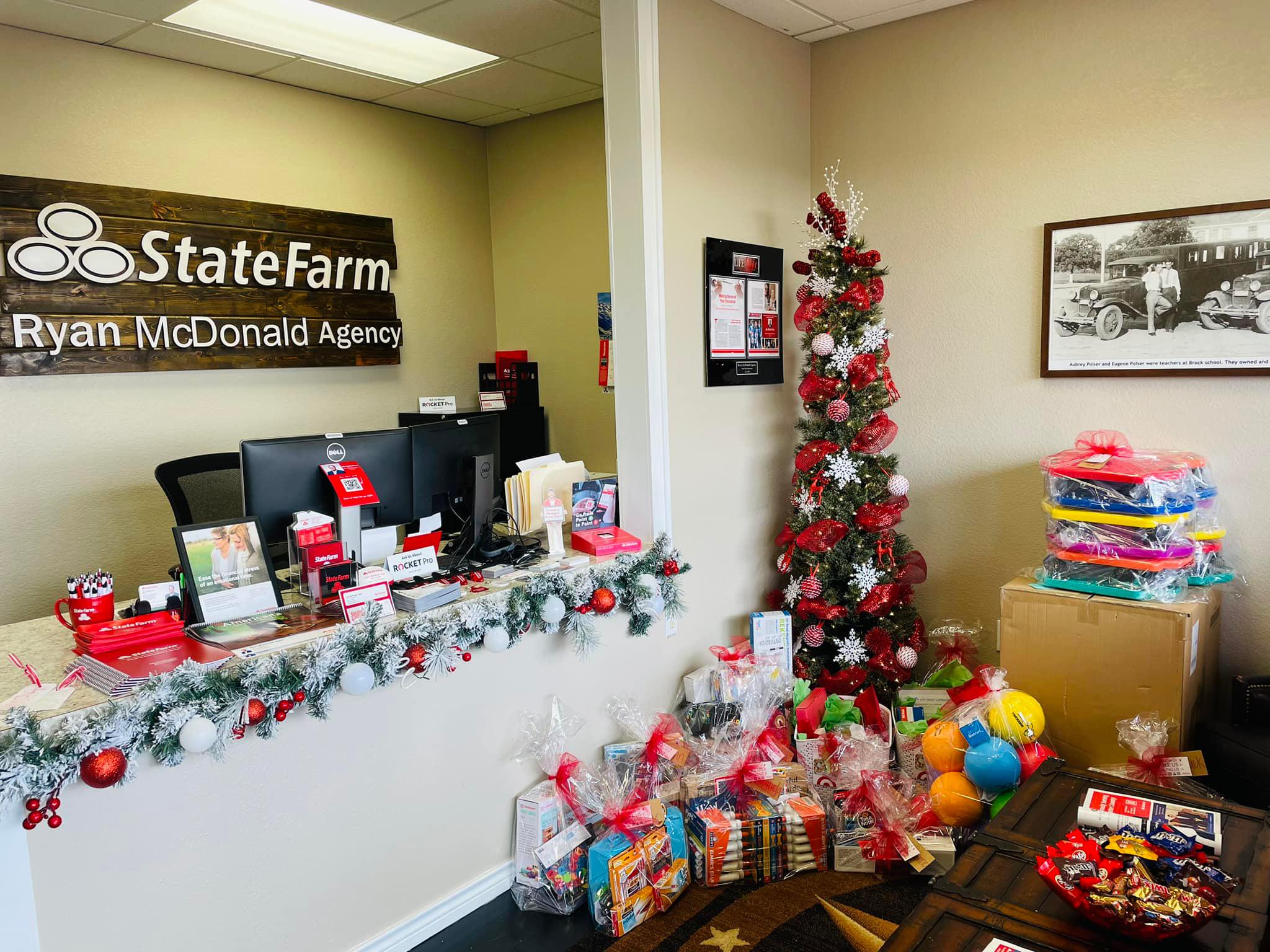 Ryan McDonald State Farm insurance agent and team collected presents for local teachers, Brock, TX